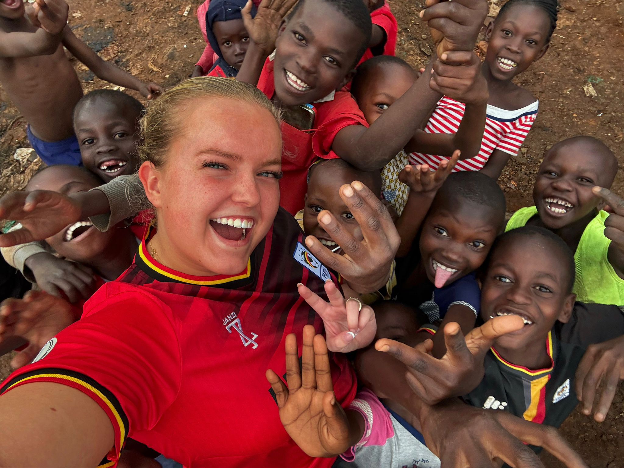 Children gathered with Field Fellow in Uganda